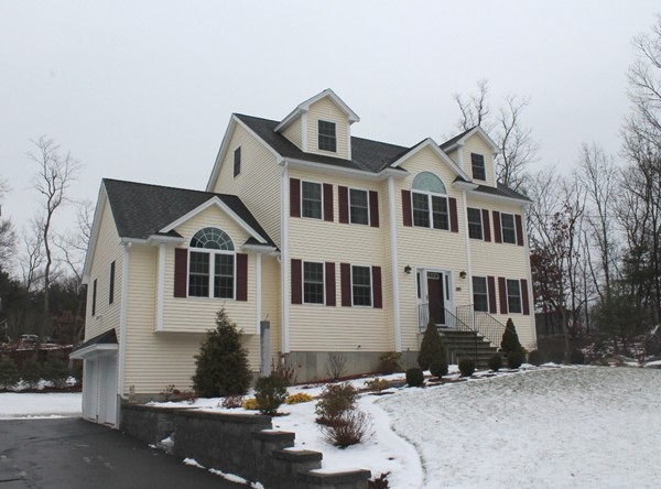 280 River St Extension Billerica, MA 01821 - Photo 1 of 23 a front view of a house with a yard