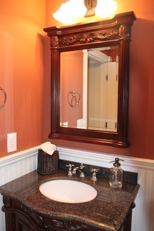280 River St Extension Billerica, MA 01821 - Photo 11 of 23 a bathroom with a granite countertop sink a mirror and a toilet