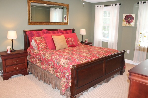 280 River St Extension Billerica, MA 01821 - Photo 13 of 23 a bedroom with a bed and a lamp on dresser