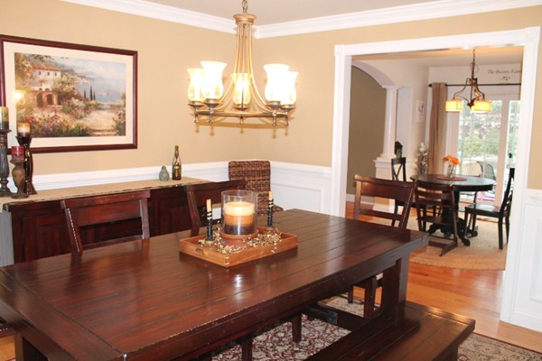 280 River St Extension Billerica, MA 01821 - Photo 4 of 23 a view of a dining room with furniture window and wooden floor