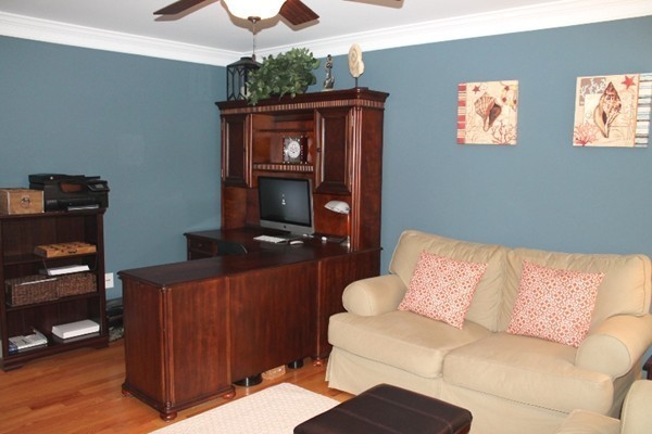 280 River St Extension Billerica, MA 01821 - Photo 10 of 23 a living room with furniture and a flat screen tv
