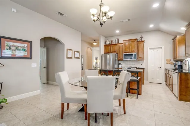 a view of a dining room with furniture