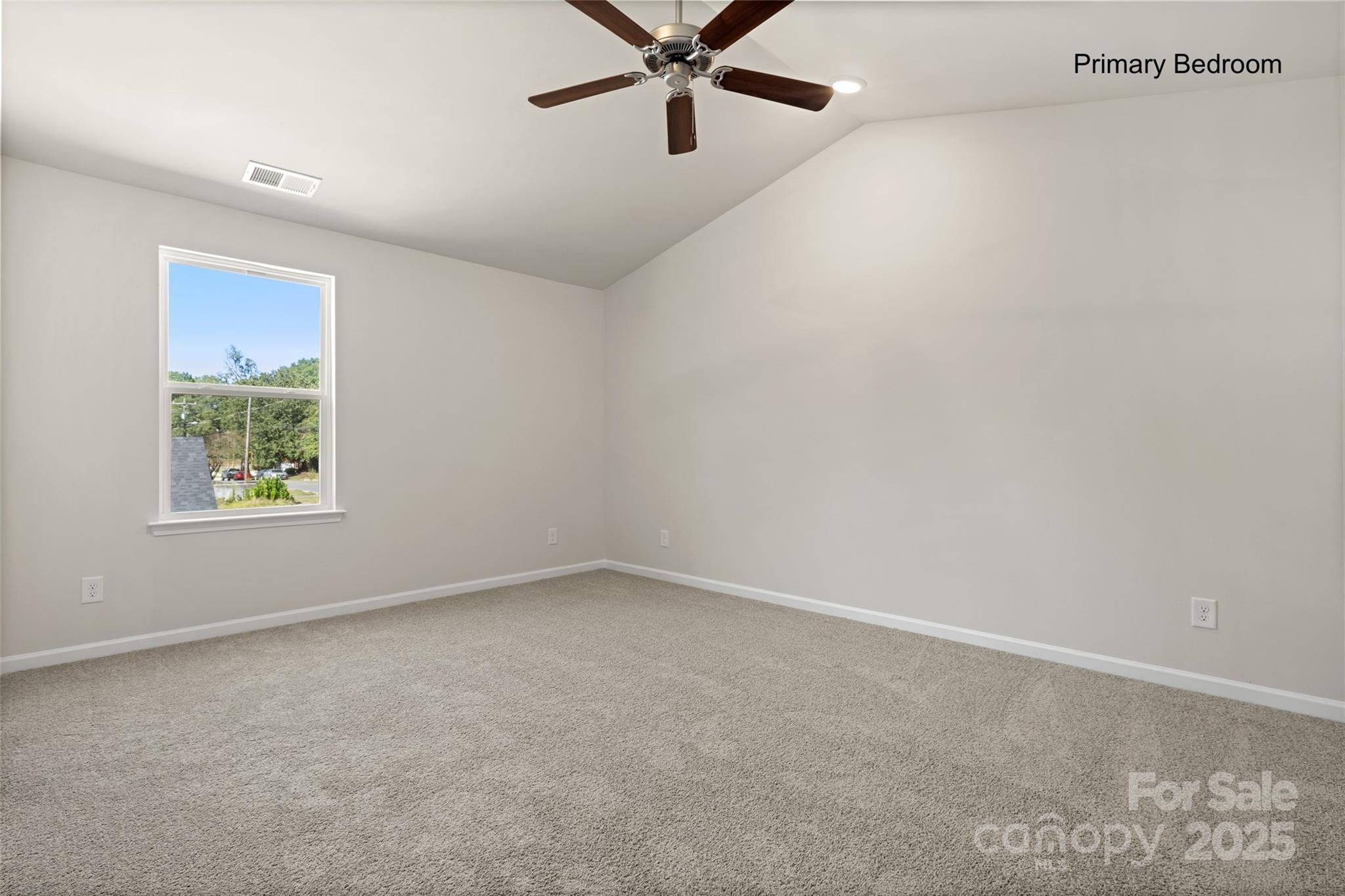 300 Elm Street Lancaster, SC 29720 - Photo 22 of 43 an empty room with windows and ceiling fan