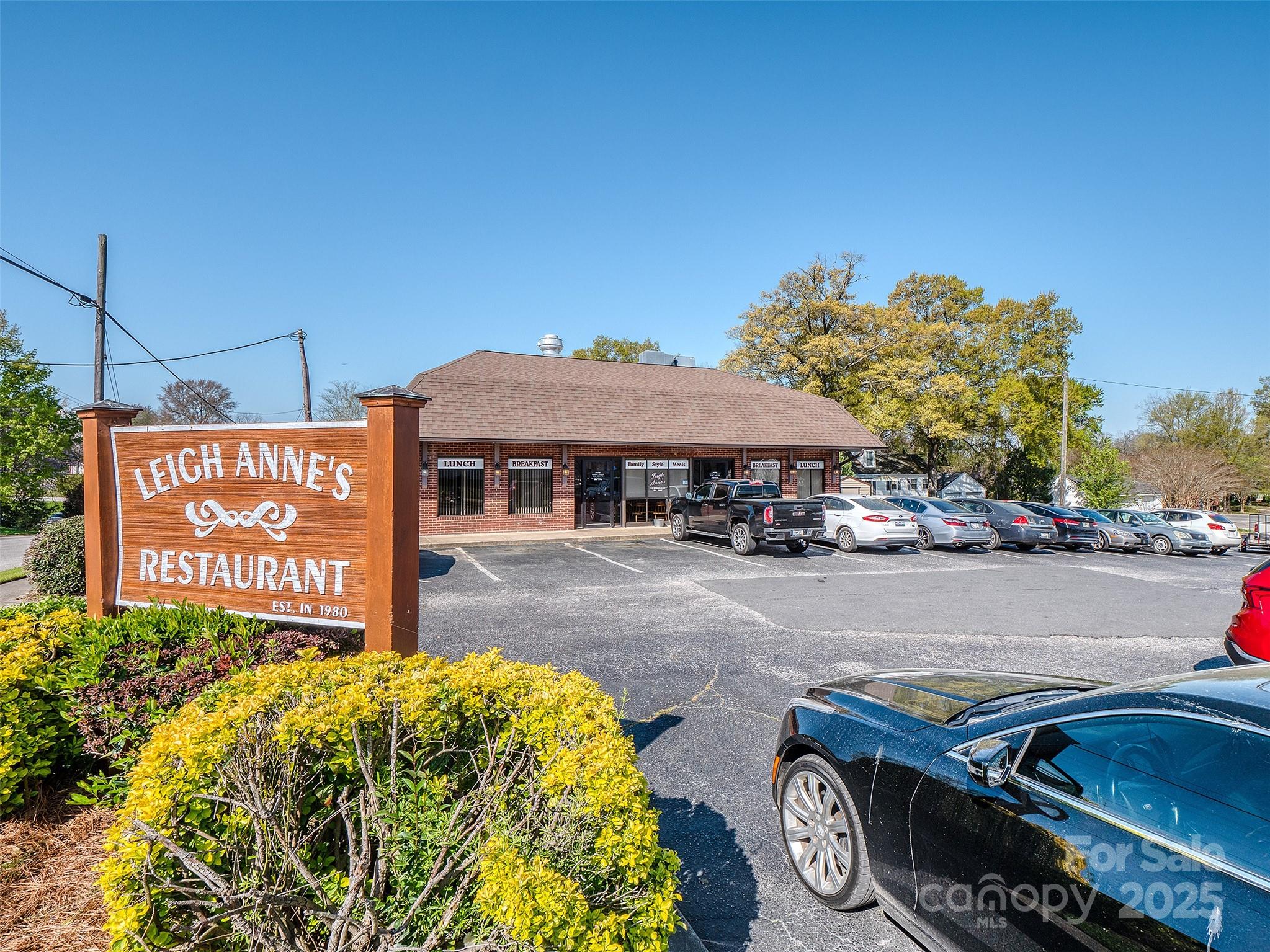 300 Elm Street Lancaster, SC 29720 - Photo 32 of 43 a front view of a house with garden