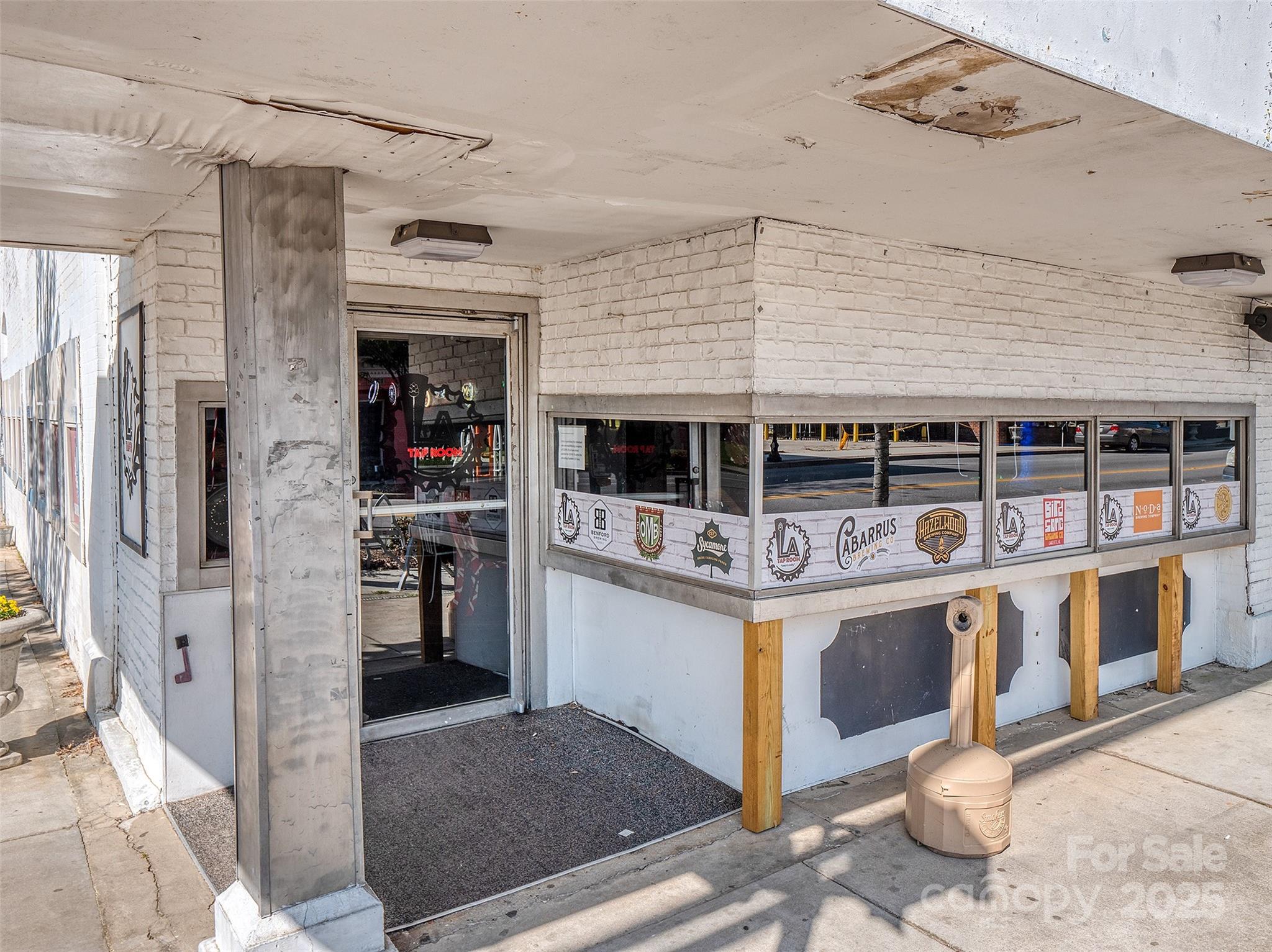 300 Elm Street Lancaster, SC 29720 - Photo 36 of 43 a view of a kitchen with stainless steel appliances kitchen island granite countertop a stove and a refrigerator