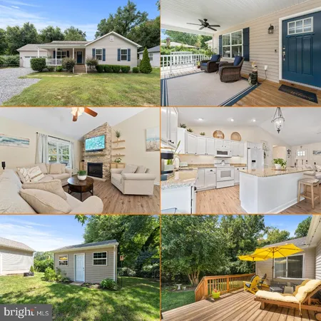 a aerial view of a house with garden space and street view