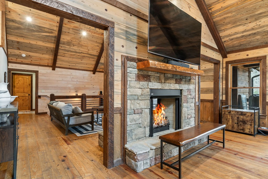 15 Bootleg Mountain Road Morganton, GA 30560 - Photo 12 of 67 a view of a porch with furniture and a fireplace