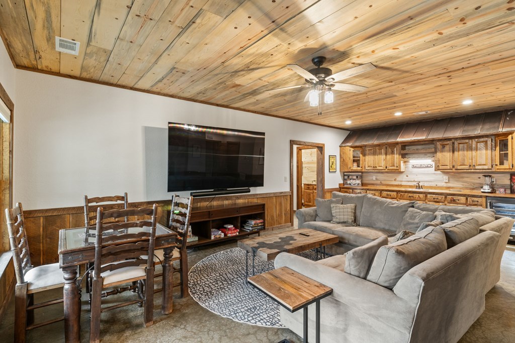 15 Bootleg Mountain Road Morganton, GA 30560 - Photo 38 of 67 a living room with furniture and a flat screen tv