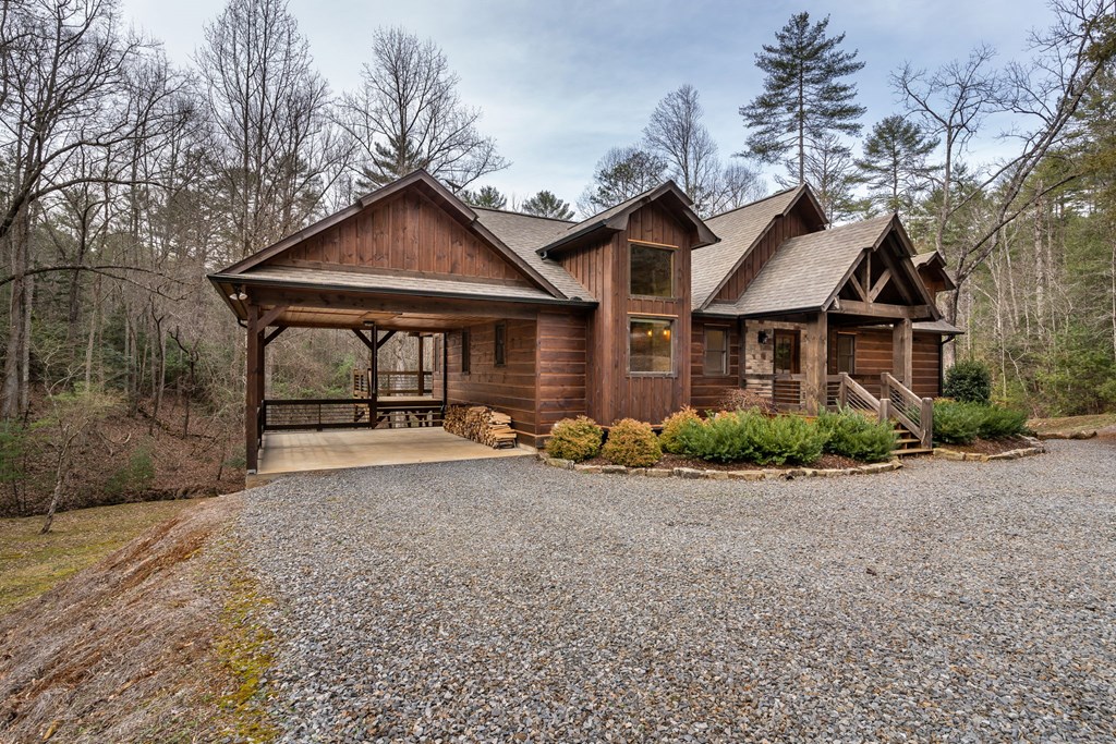 15 Bootleg Mountain Road Morganton, GA 30560 - Photo 4 of 67 a view of a house with a yard and large tree