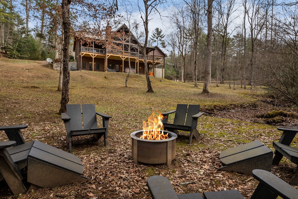 15 Bootleg Mountain Road Morganton, GA 30560 - Photo 56 of 67 a front view of a house with a yard