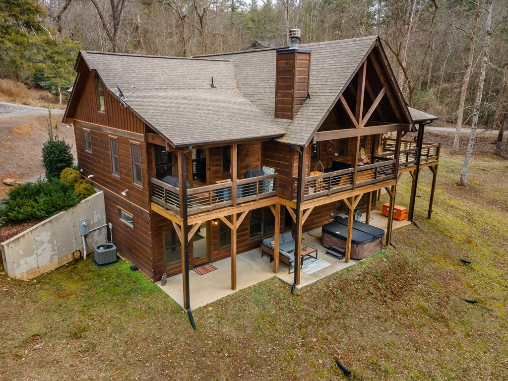 15 Bootleg Mountain Road Morganton, GA 30560 - Photo 65 of 67 an aerial view of a house a yard and wooden fence