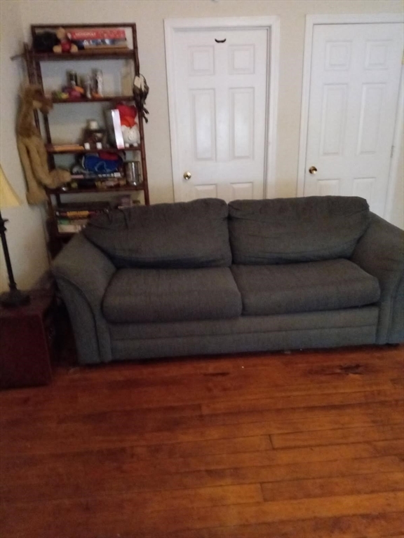 441 Main Street Hardwick, MA 01031 - Photo 14 of 26 a living room with furniture and a flat screen tv