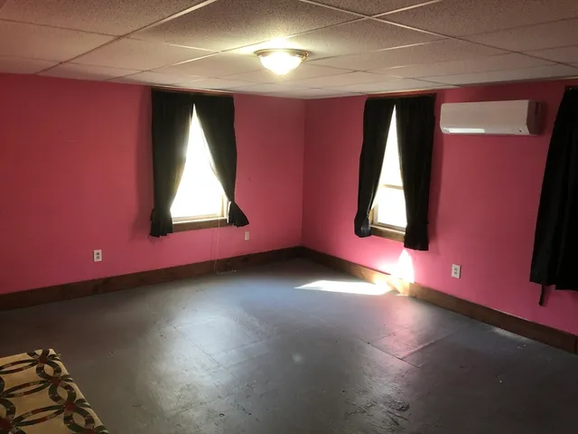 an empty room with windows