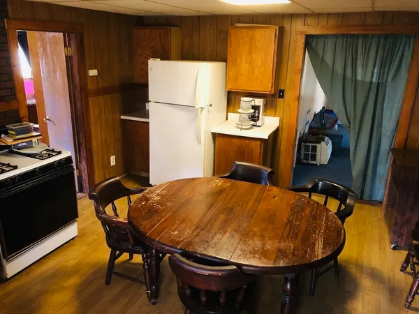 a bed room with a bed and a table