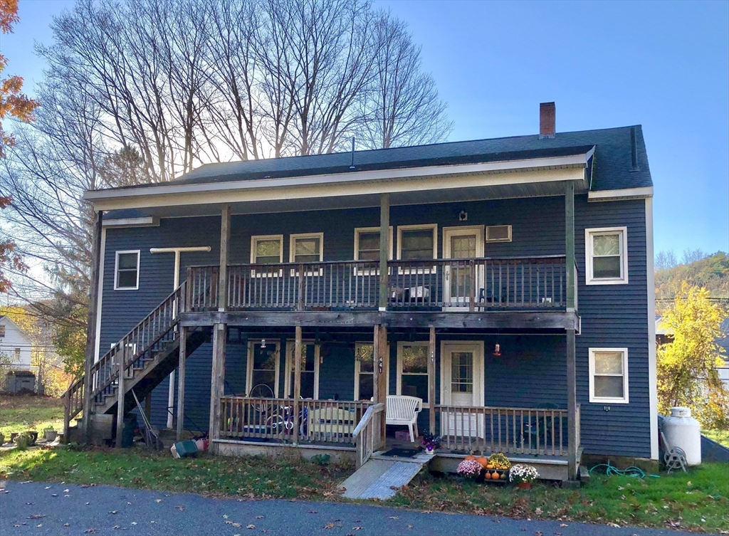 441 Main Street Hardwick, MA 01031 - Photo 2 of 26 a front view of a house with garden