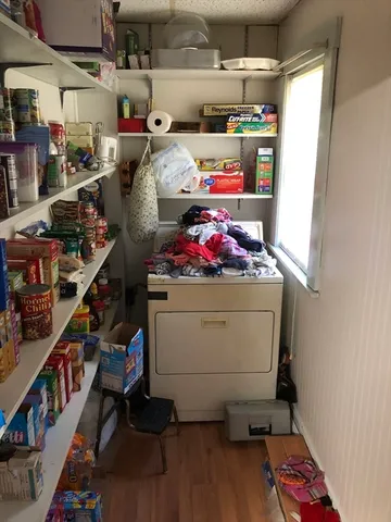 a storage room with washer and dryer