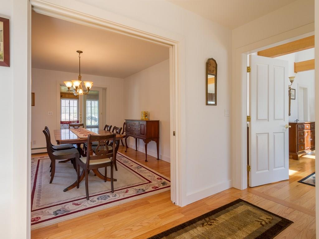 86 Spring Hill Loop Chamberlain, ME 04541 - Photo 8 of 35 View through the dining room towards...