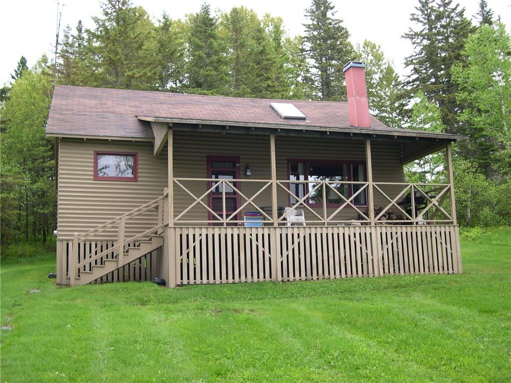 62 Hernborg Road Rangeley, ME 04970 - Photo 27 of 30 lakeside of cottage close up