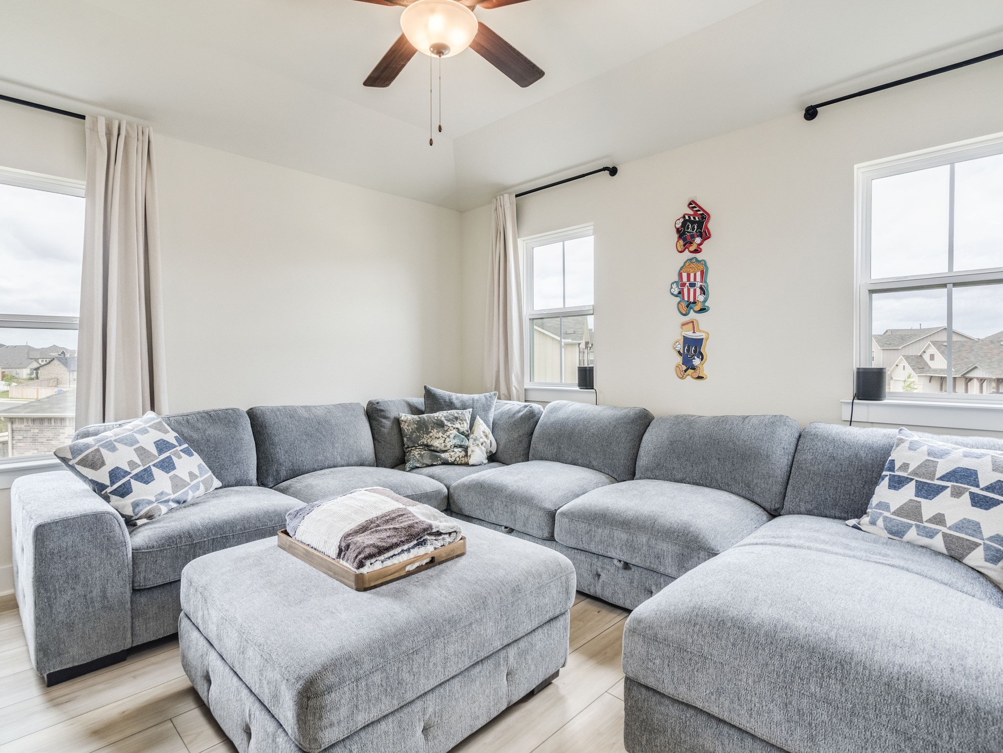 297 Tree Nut Loop Buda, TX 78610 - Photo 16 of 25 Upstairs has its own secondary living room! Imagine teen space, movie nights, study/library whatever you desire