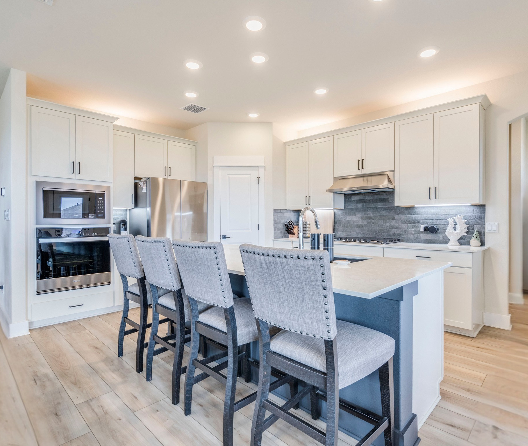 297 Tree Nut Loop Buda, TX 78610 - Photo 6 of 25 Pull up more seats at the eat up kitchen island