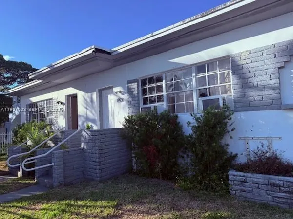 a view of house with outdoor space