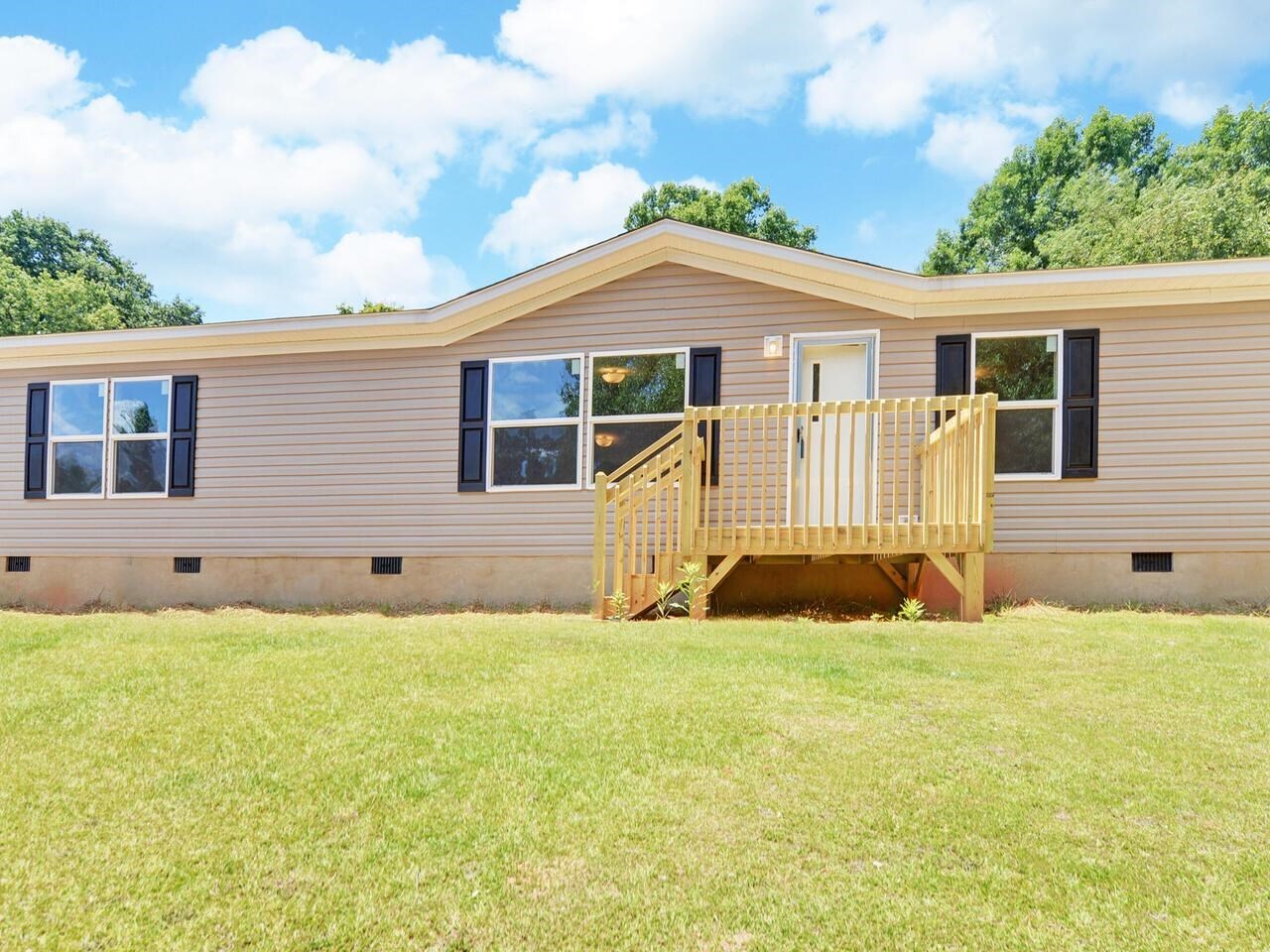 369 Cromers Bridge Road Royston, GA 30662 - Photo 1 of 1 a front view of a house with a yard