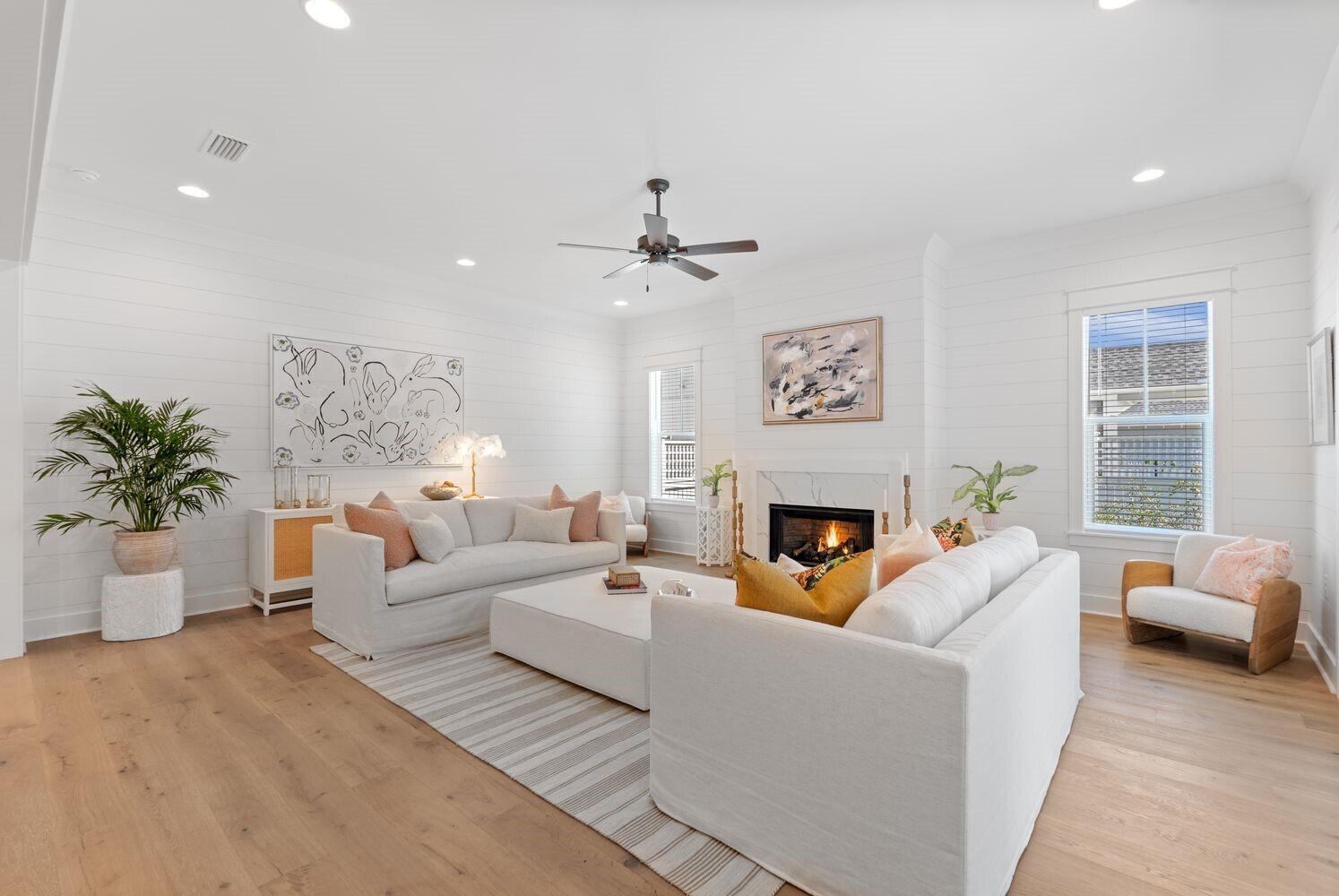 117 Rosecourt St Inlet Beach Inlet Beach, FL 32461 - Photo 11 of 62 a living room with furniture a fireplace and potted plant