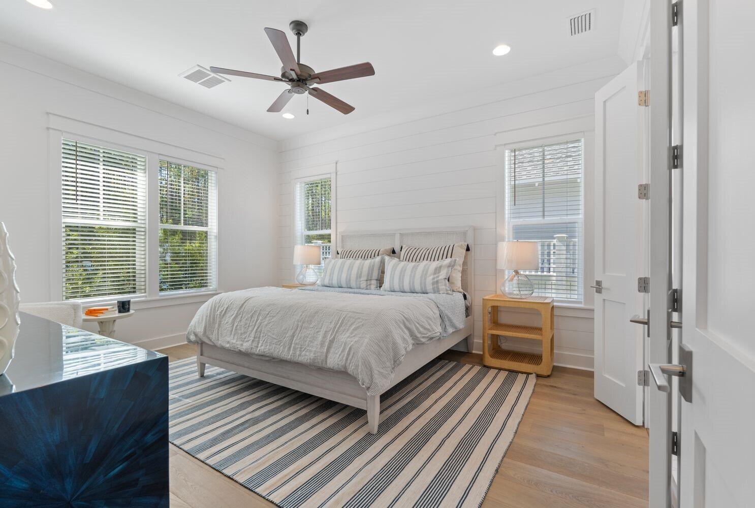 117 Rosecourt St Inlet Beach Inlet Beach, FL 32461 - Photo 24 of 62 a bedroom with a bed and a large window