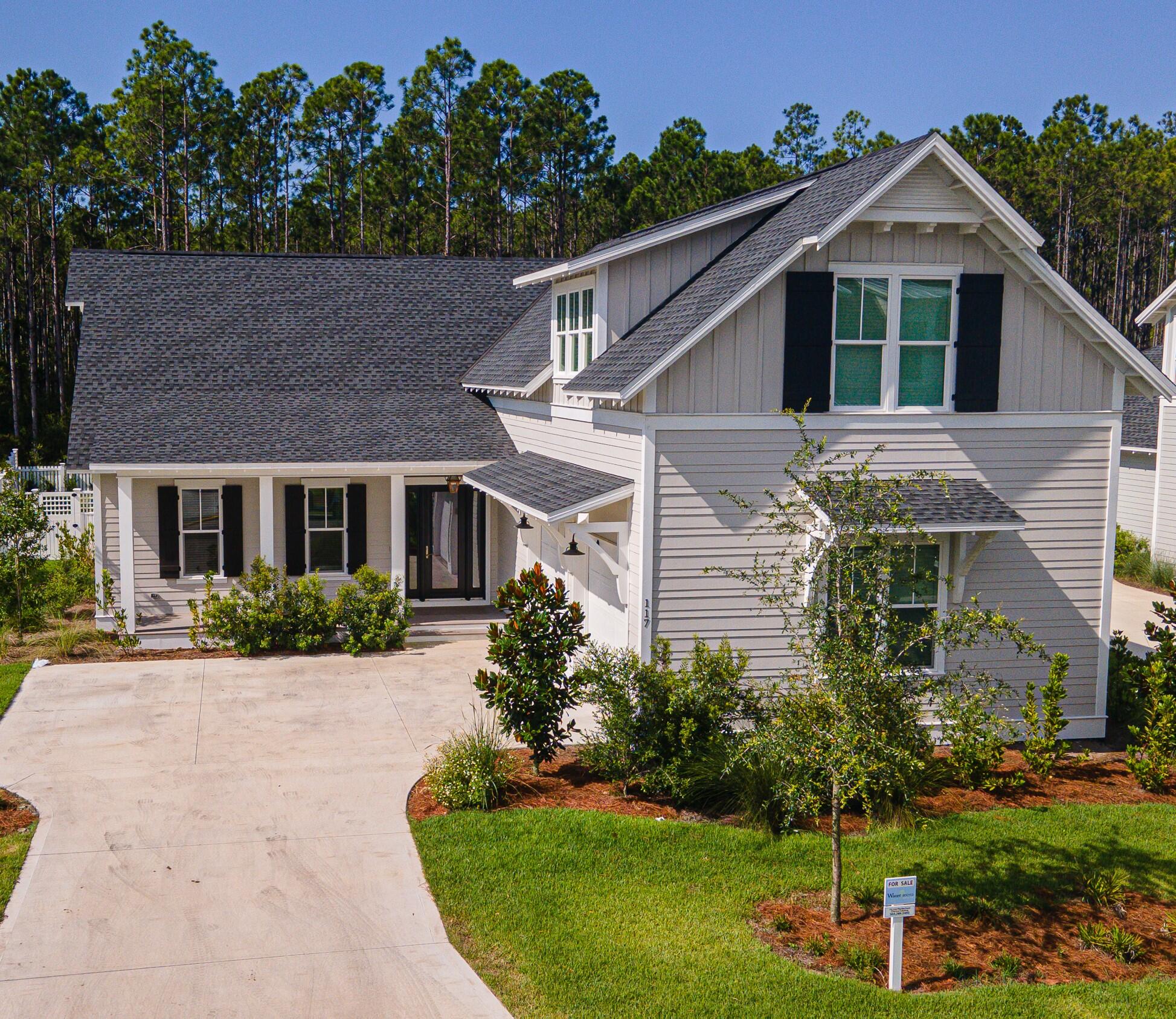117 Rosecourt St Inlet Beach Inlet Beach, FL 32461 - Photo 3 of 62 a front view of a house with a yard