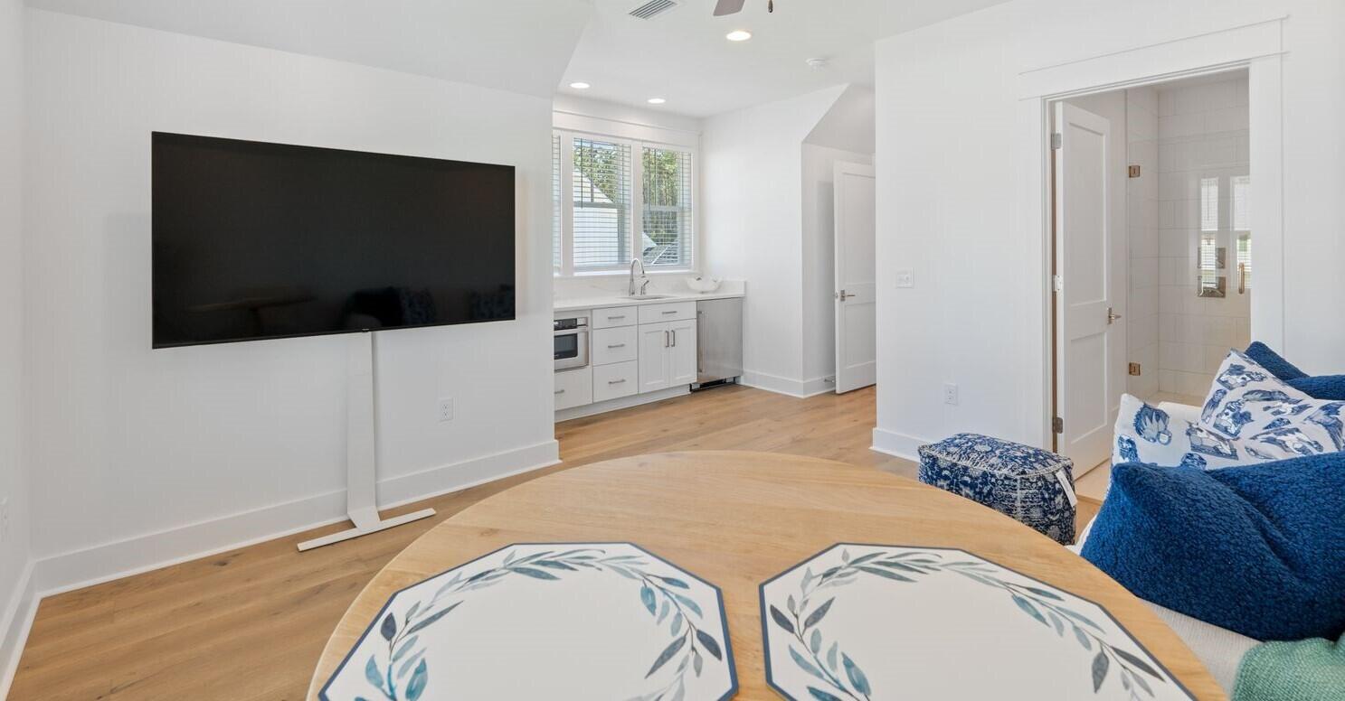 117 Rosecourt St Inlet Beach Inlet Beach, FL 32461 - Photo 37 of 62 a bedroom with a bed and a flat screen tv