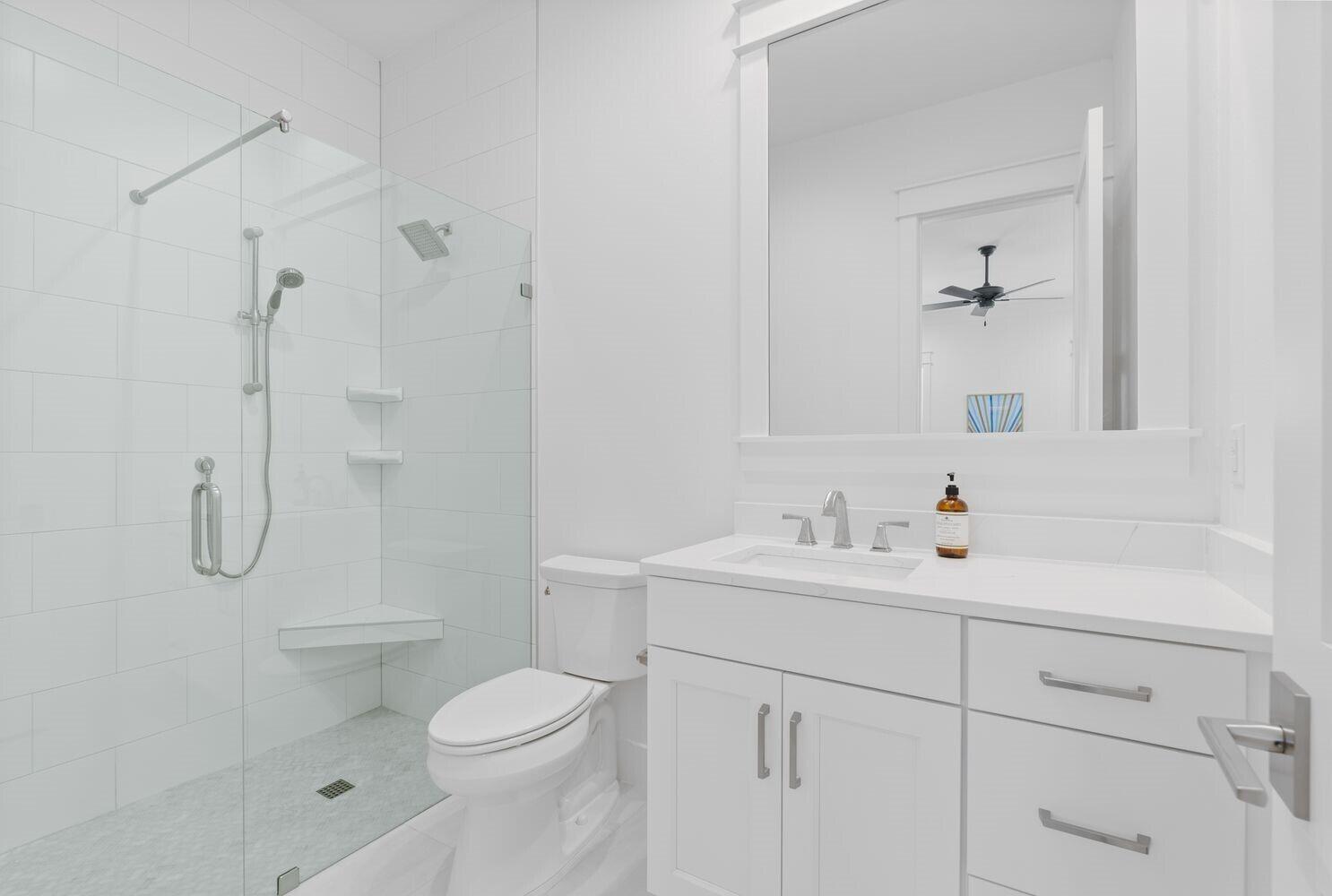 117 Rosecourt St Inlet Beach Inlet Beach, FL 32461 - Photo 42 of 62 a bathroom with a sink a toilet and shower