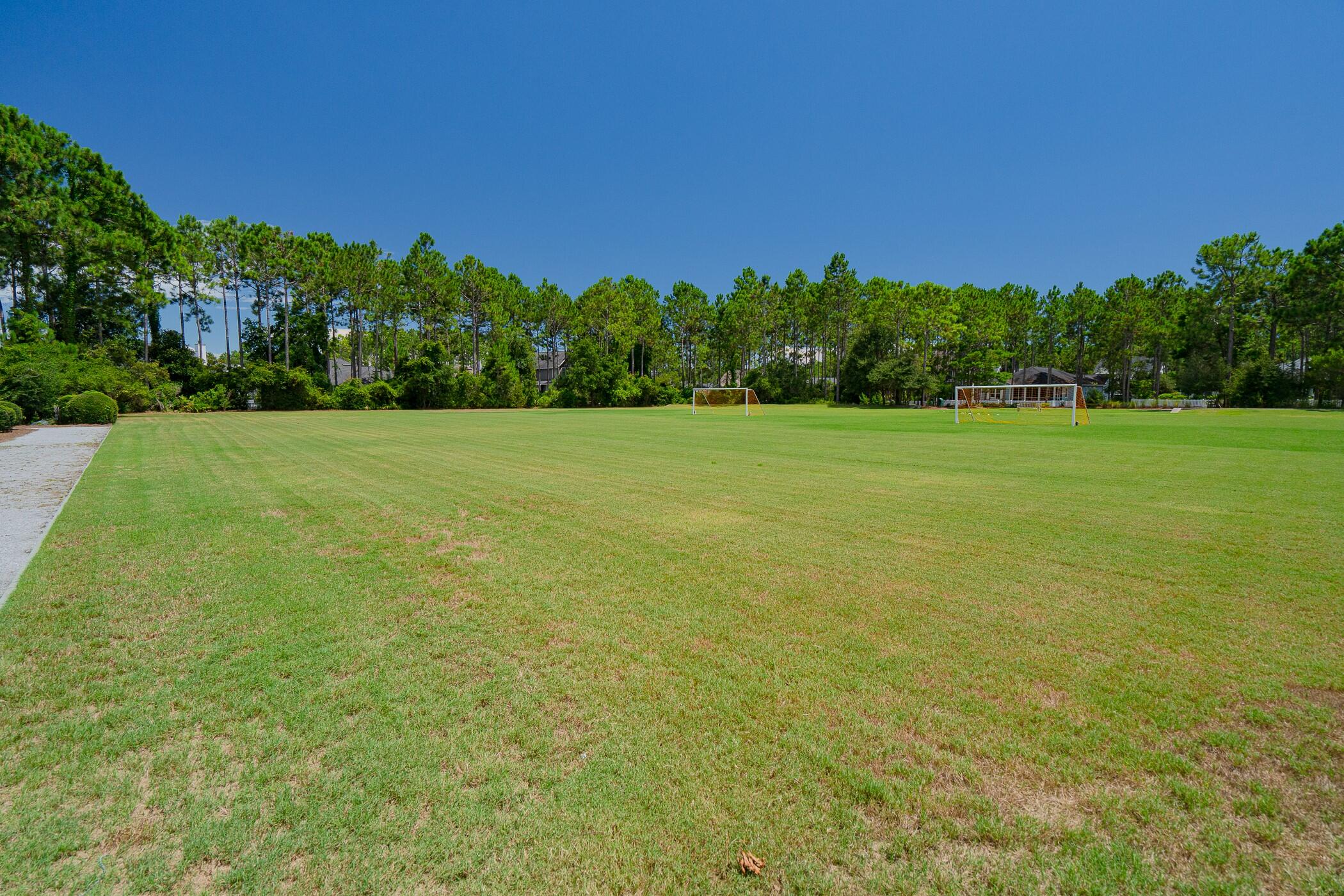 117 Rosecourt St Inlet Beach Inlet Beach, FL 32461 - Photo 45 of 62 a view of field with trees in the background
