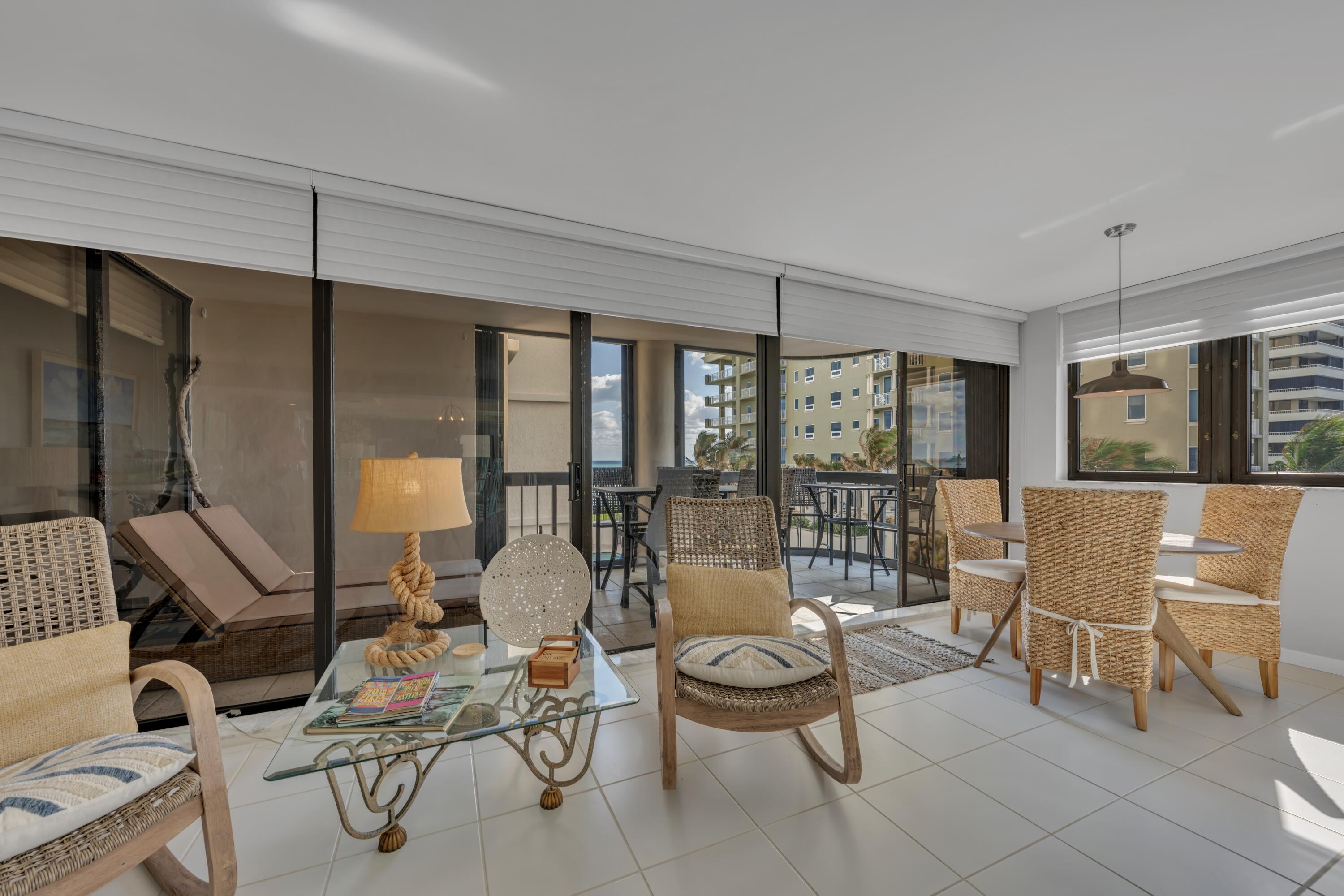 5380 North Ocean Drive, Unit 4A Singer Island, FL 33404 - Photo 22 of 75 Living room sitting area with balcony vi