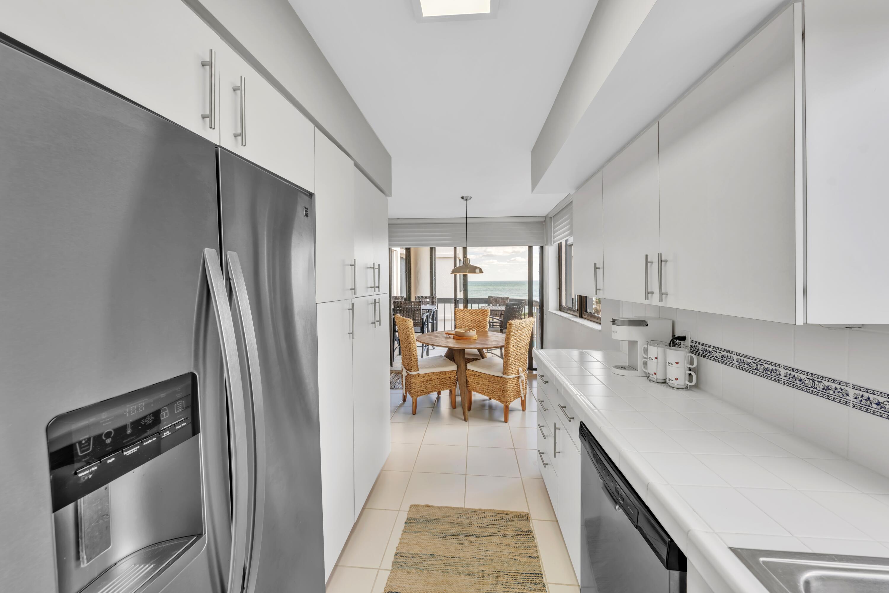 5380 North Ocean Drive, Unit 4A Singer Island, FL 33404 - Photo 25 of 75 Kitchen with breakfast nook and views