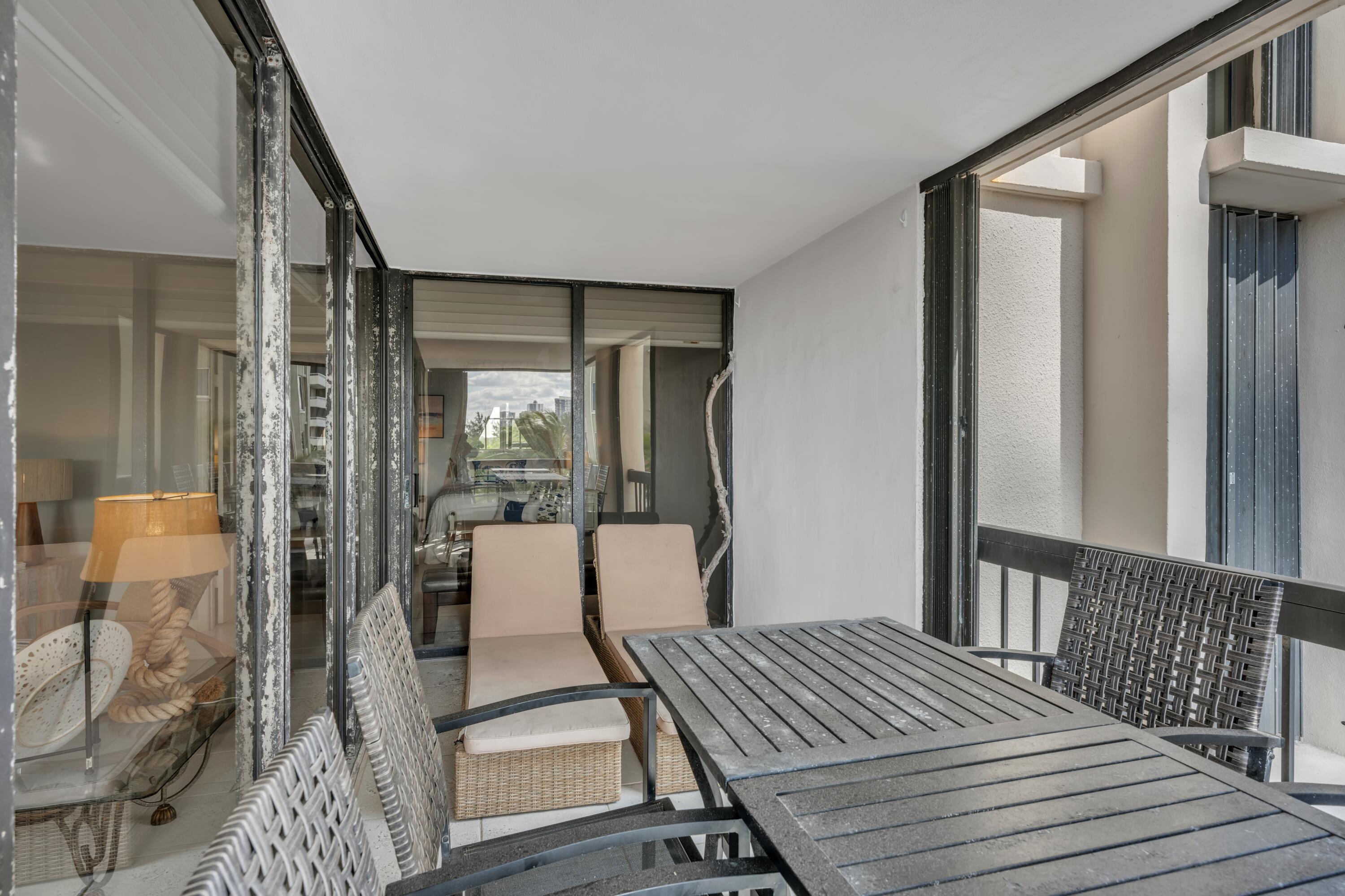 5380 North Ocean Drive, Unit 4A Singer Island, FL 33404 - Photo 45 of 75 Balcony with sitting and dining areas