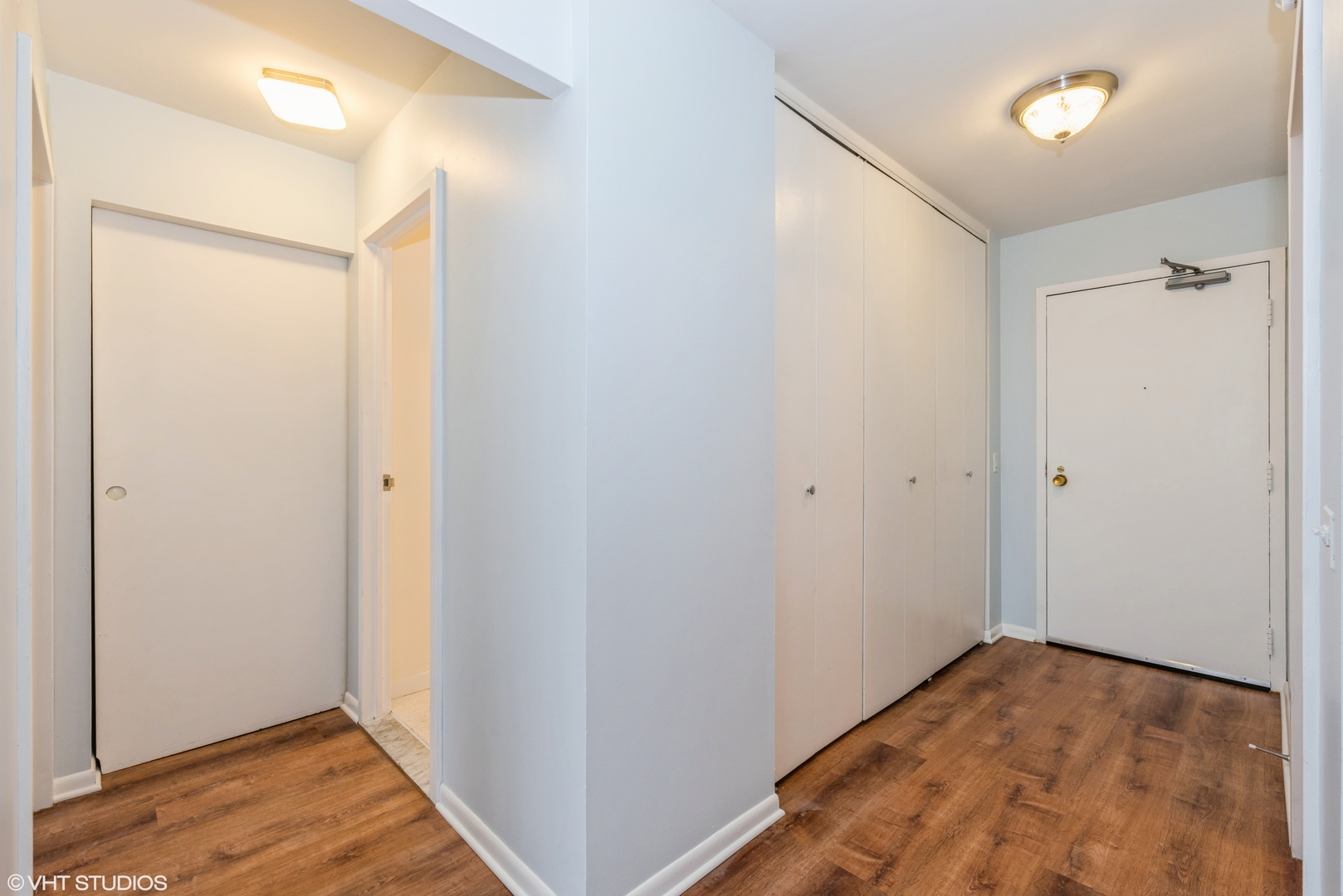 5415 North Sheridan Road, Unit 3814 Chicago, IL 60640 - Photo 8 of 25 a view of hallway with closet and wooden floor