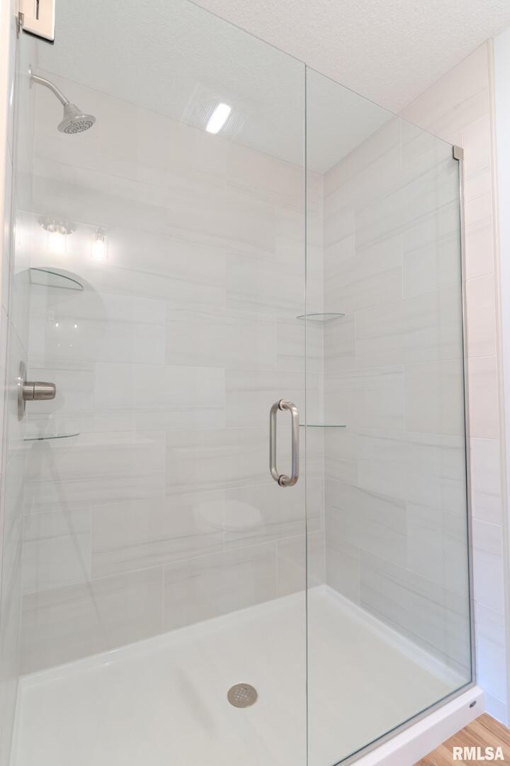 941 9th Avenue North Clinton, IA 52732 - Photo 12 of 24 a bathroom with a shower