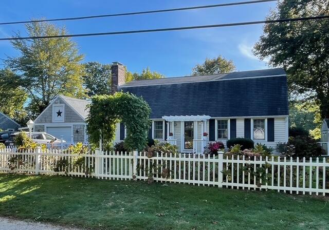 114 Stoney Cliff Road Centerville, MA 02632 - Photo 1 of 1 a front view of a house with a garden