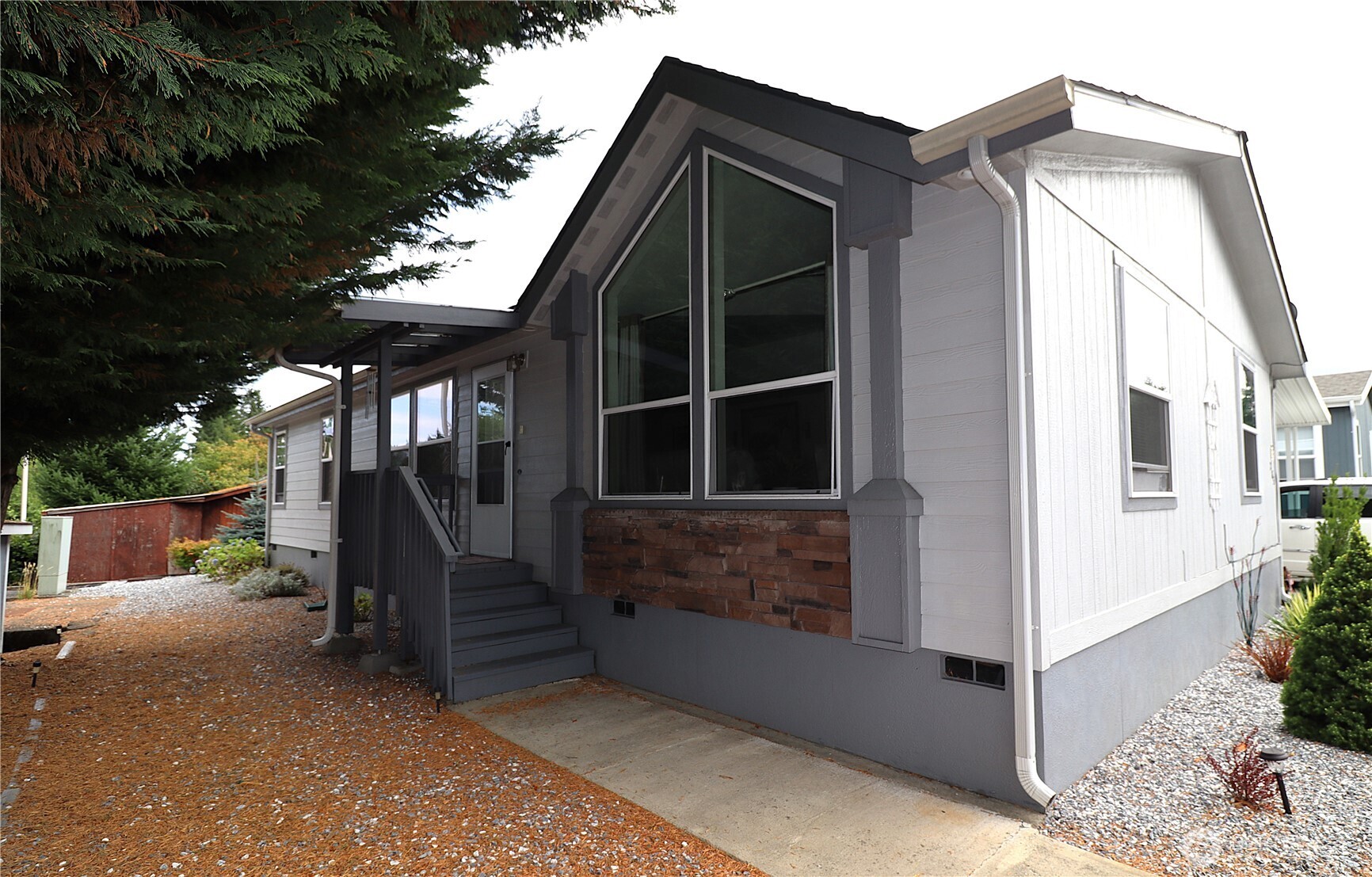 1111 Archwood Drive Southwest, Unit 285 Olympia, WA 98502 - Photo 2 of 17 a view of house with outdoor space