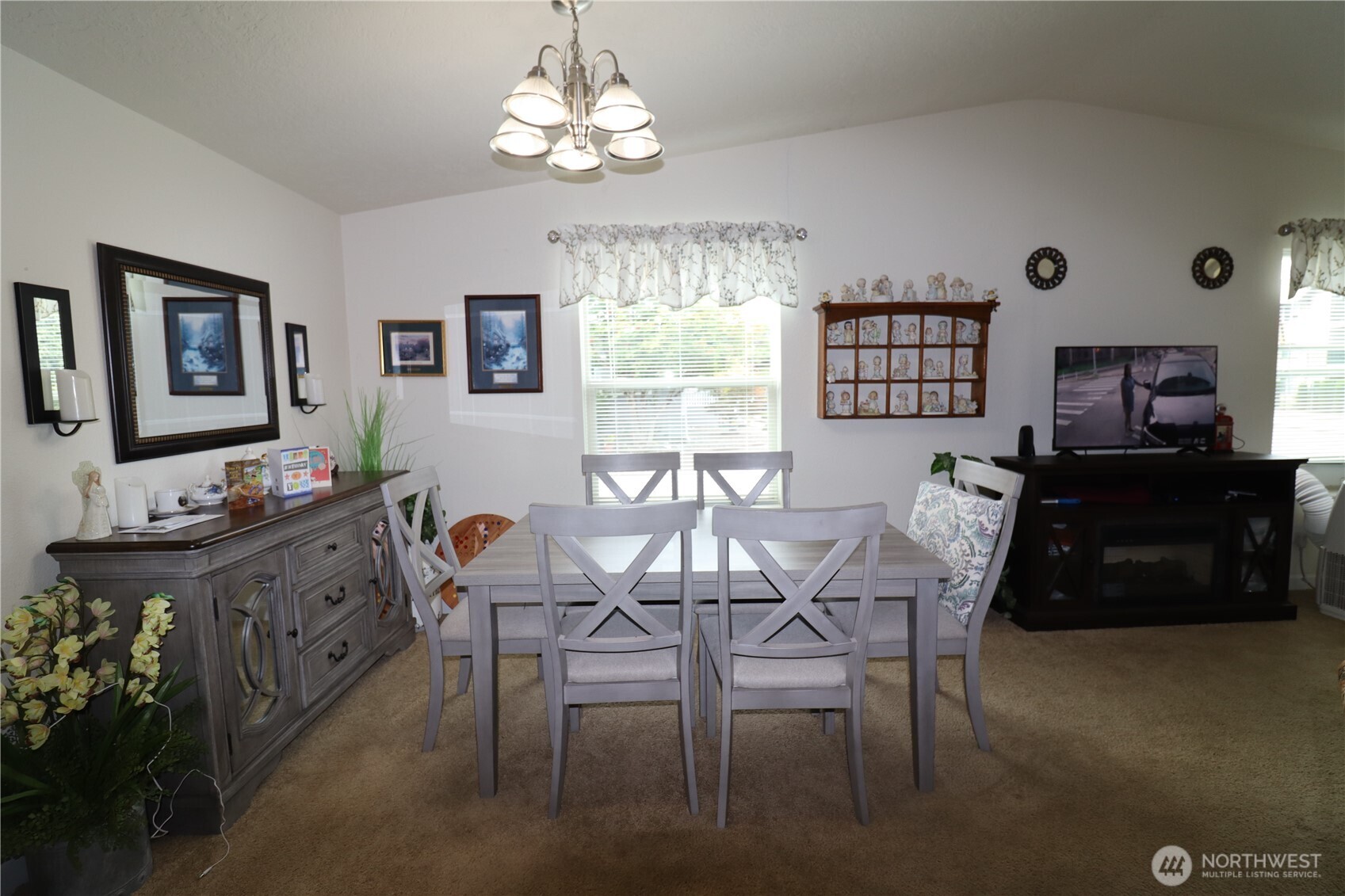 1111 Archwood Drive Southwest, Unit 285 Olympia, WA 98502 - Photo 7 of 17 a view of a dining room with furniture and chandelier