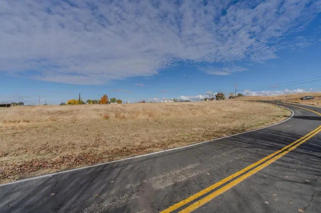 a view of beach and yard