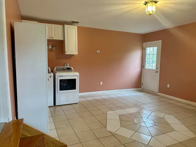 a view of a livingroom with a fireplace