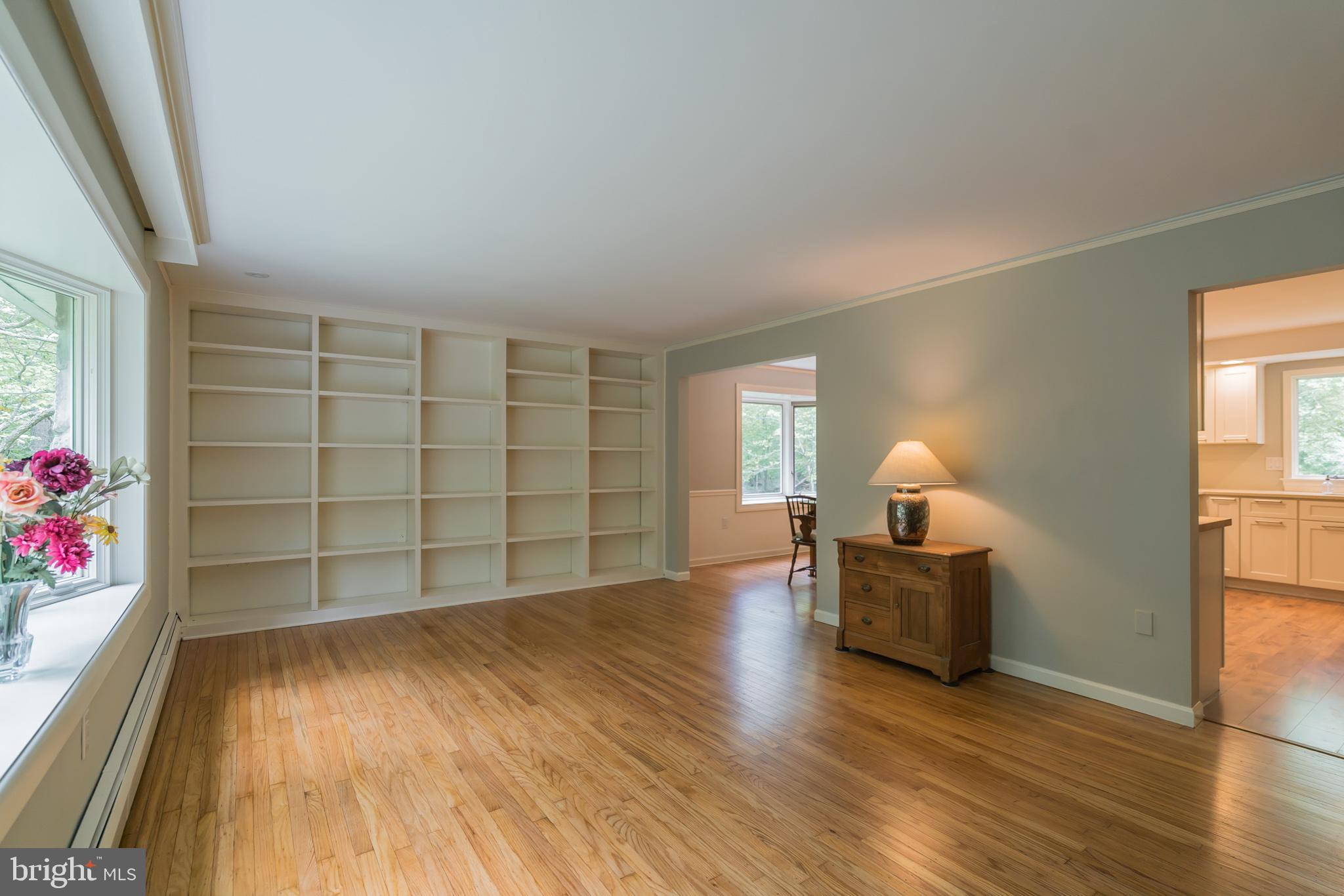 6249 Stump Road Pipersville, PA 18947 - Photo 12 of 31 Living room with wall of built-ins