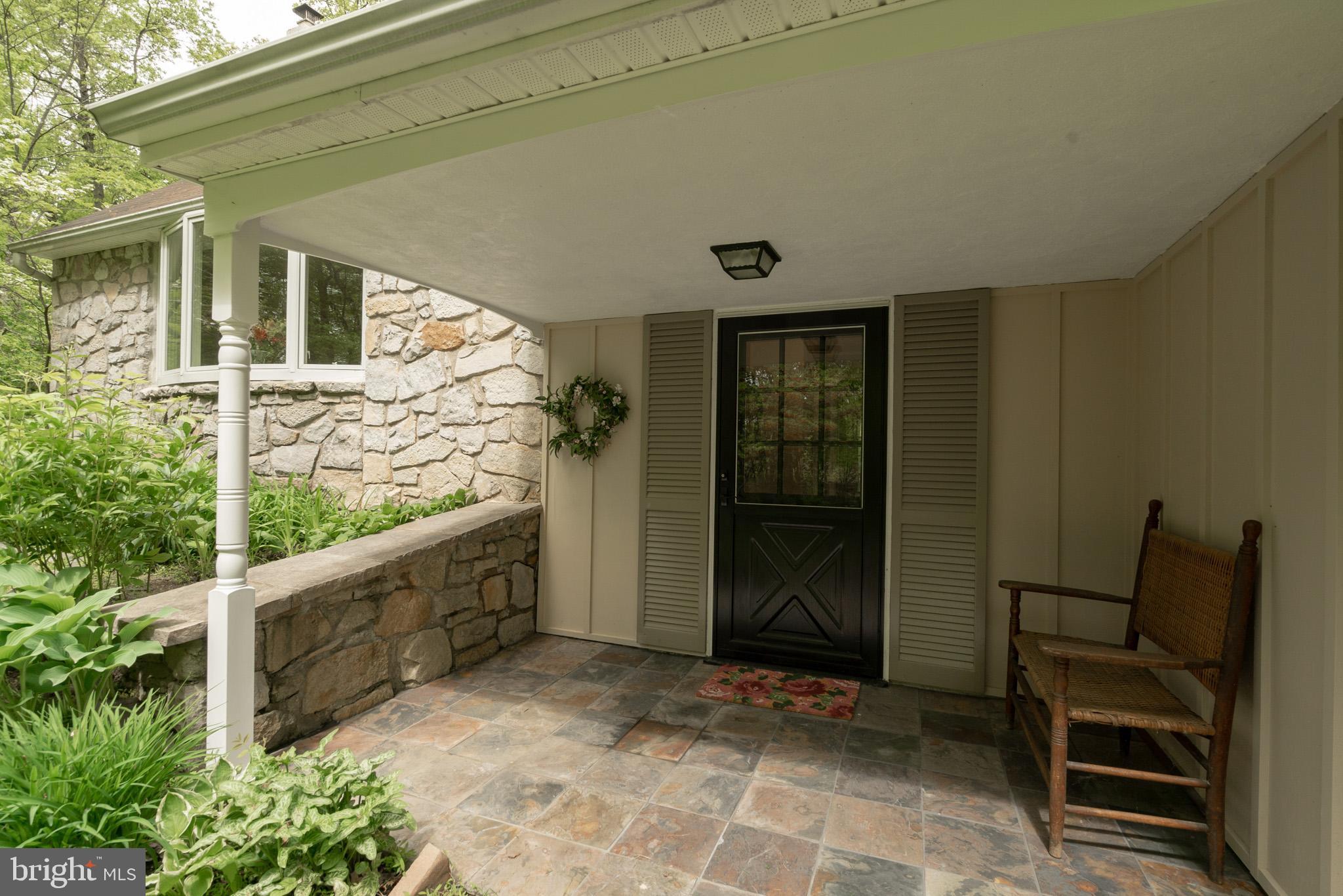 6249 Stump Road Pipersville, PA 18947 - Photo 3 of 31 Main entry with covered porch and flagstones
