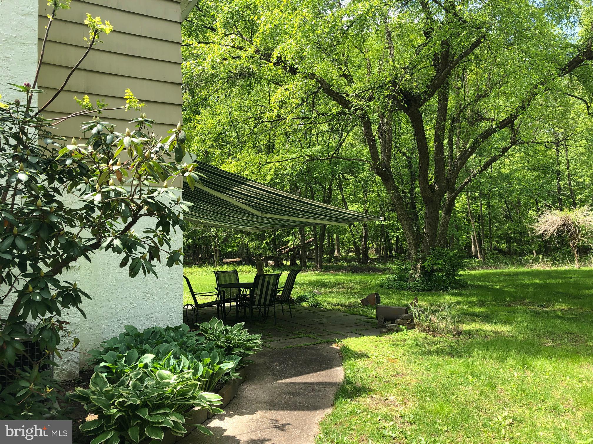 6249 Stump Road Pipersville, PA 18947 - Photo 23 of 31 Back patio with retractable awning