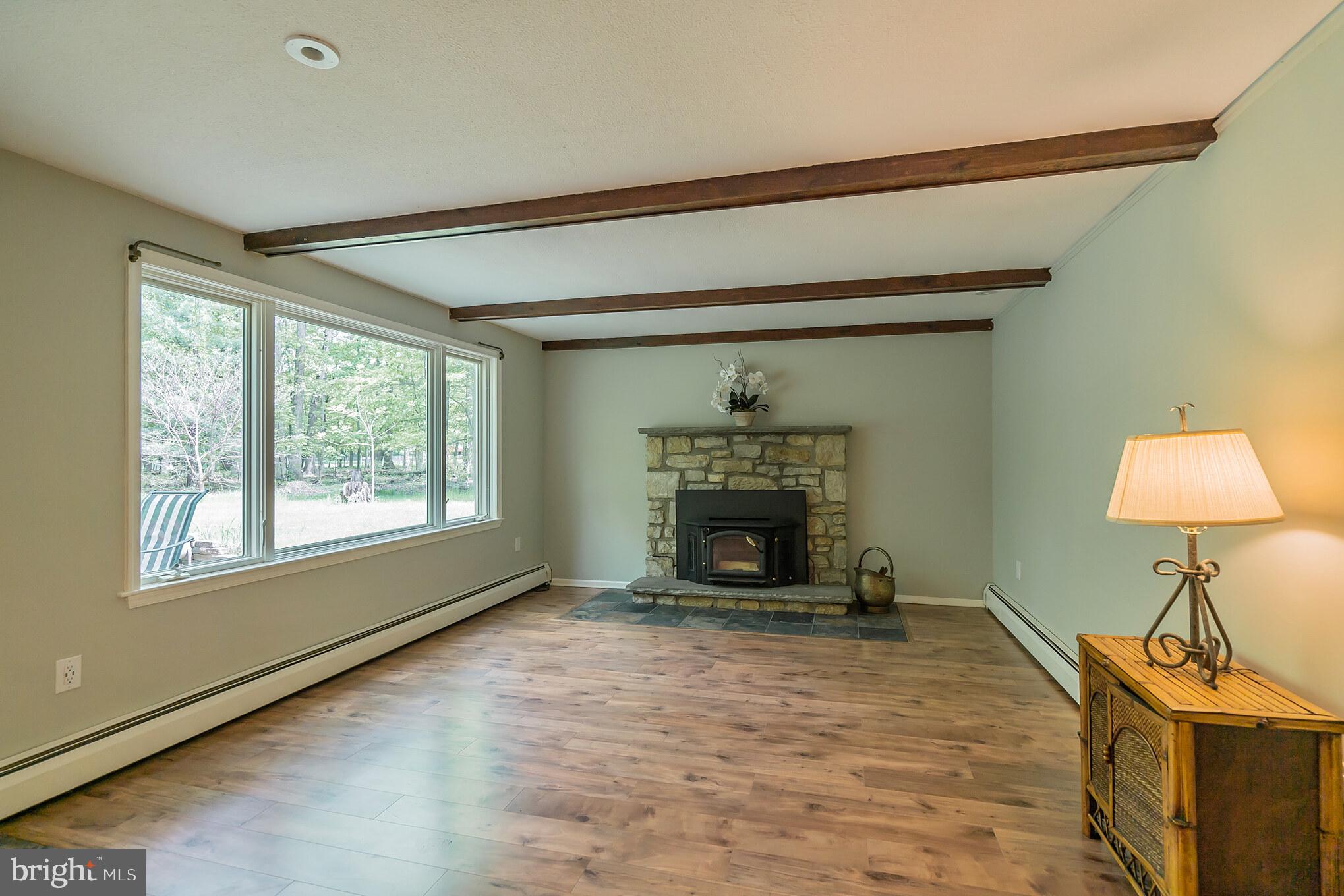 6249 Stump Road Pipersville, PA 18947 - Photo 5 of 31 Wood burning fireplace in family room