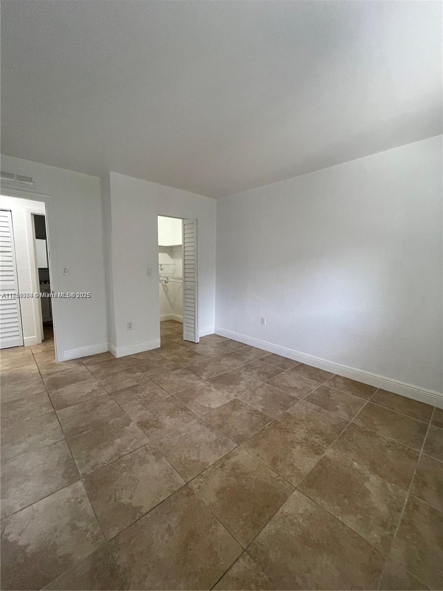 8607 Southwest 68th Court, Unit 26 Pinecrest, FL 33156 - Photo 11 of 22 Master Bedroom