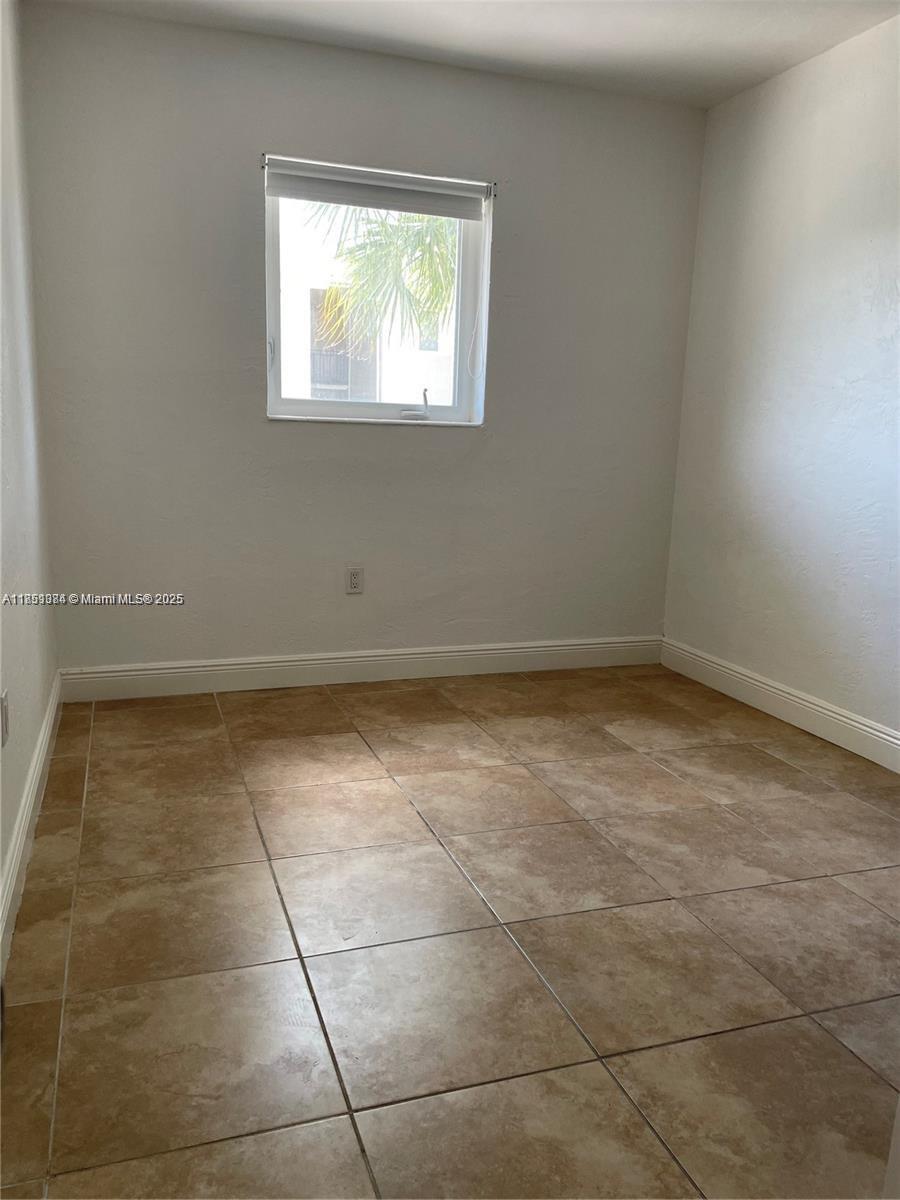 8607 Southwest 68th Court, Unit 26 Pinecrest, FL 33156 - Photo 7 of 22 2nd Bedroom