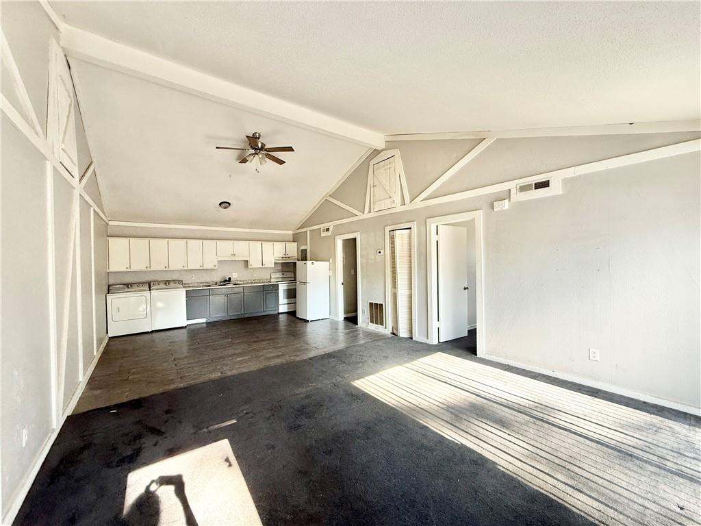 4701 Flat Shoals Road, Unit 2B Union City, GA 30291 - Photo 3 of 14 an empty room with wooden floor and windows