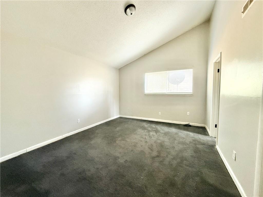 4701 Flat Shoals Road, Unit 2B Union City, GA 30291 - Photo 8 of 14 an empty room with a window
